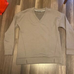 Grey/brownish sweater shirt type top